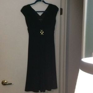 Little Black cap sleeve Dress with small goldtone metal trim on V neck front.
